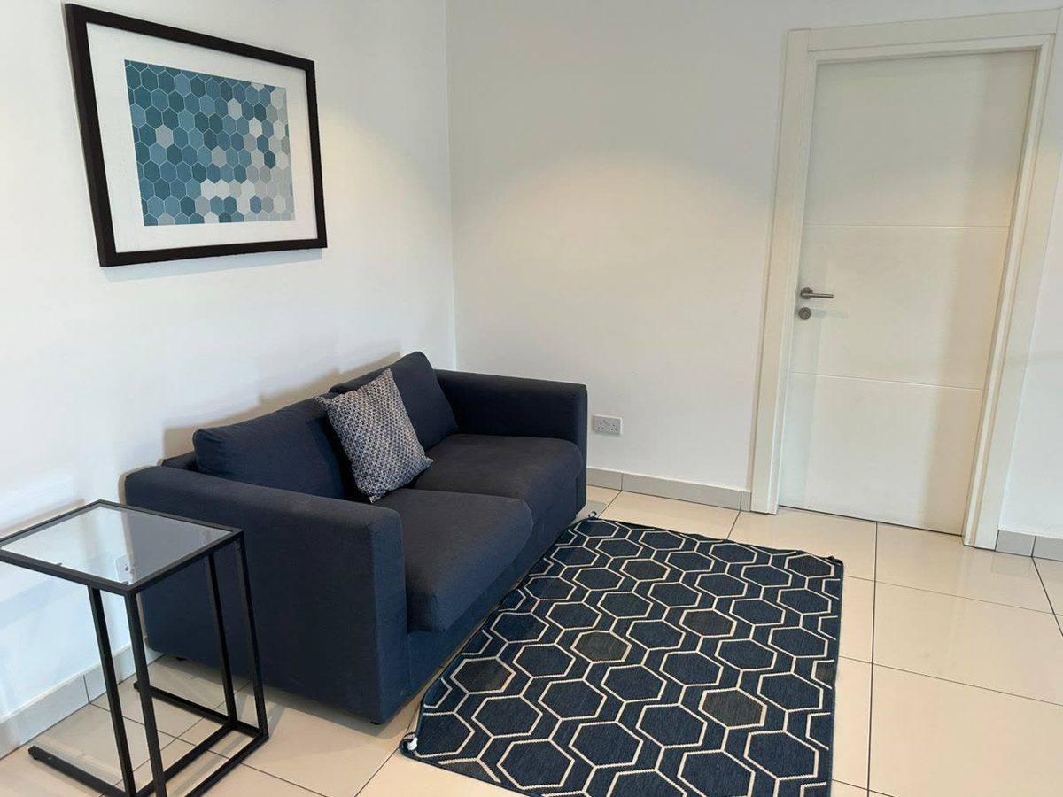Spacious Accra living room in a rented apartment